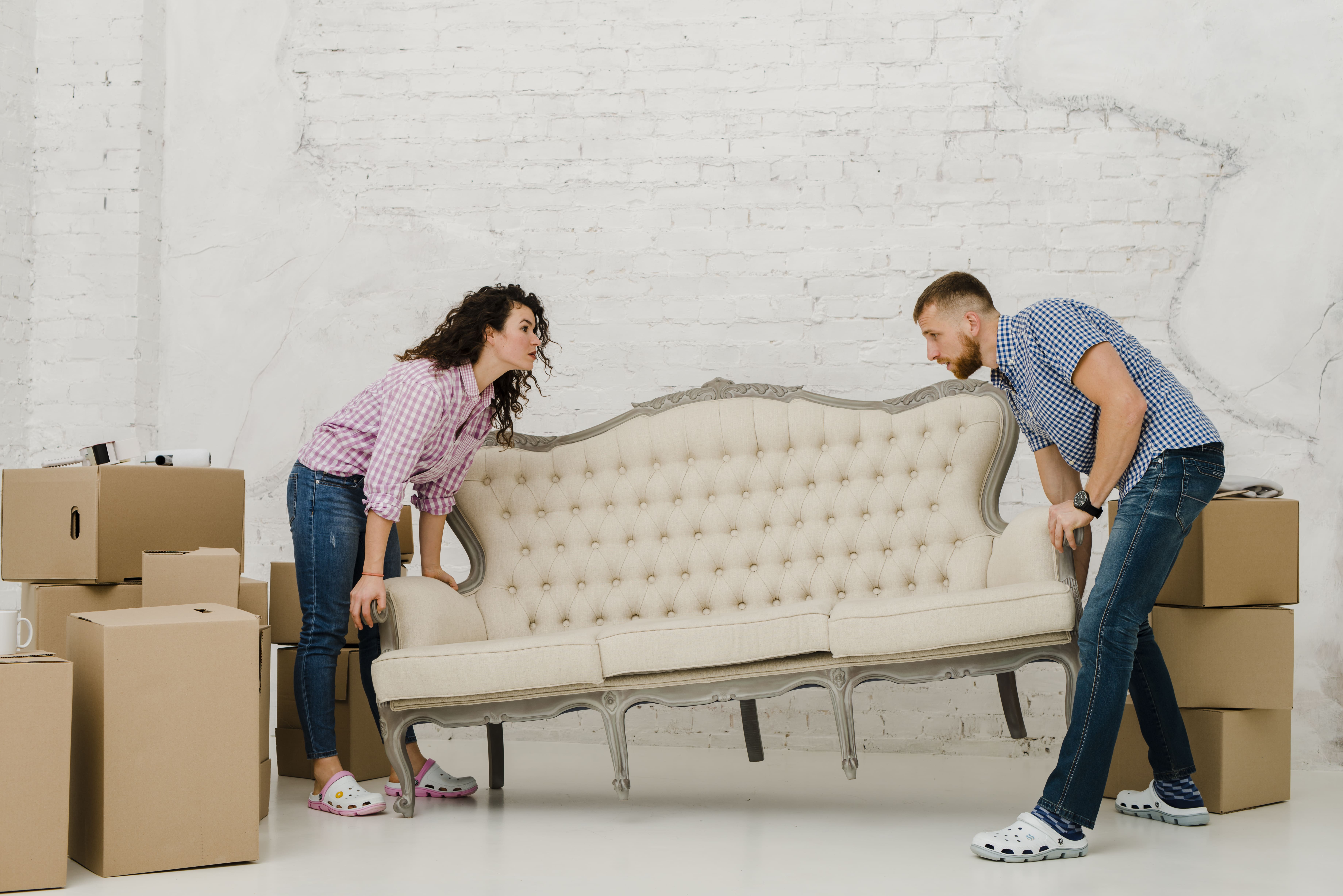 moving furniture woman with man