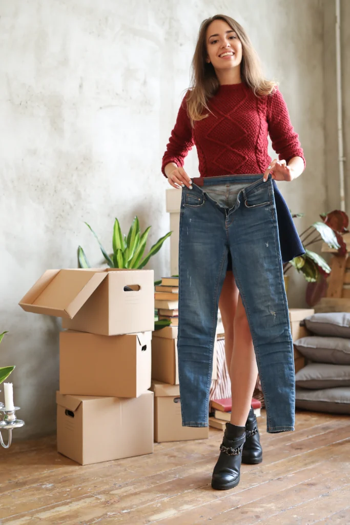 woman prepare to packing clothes for moving