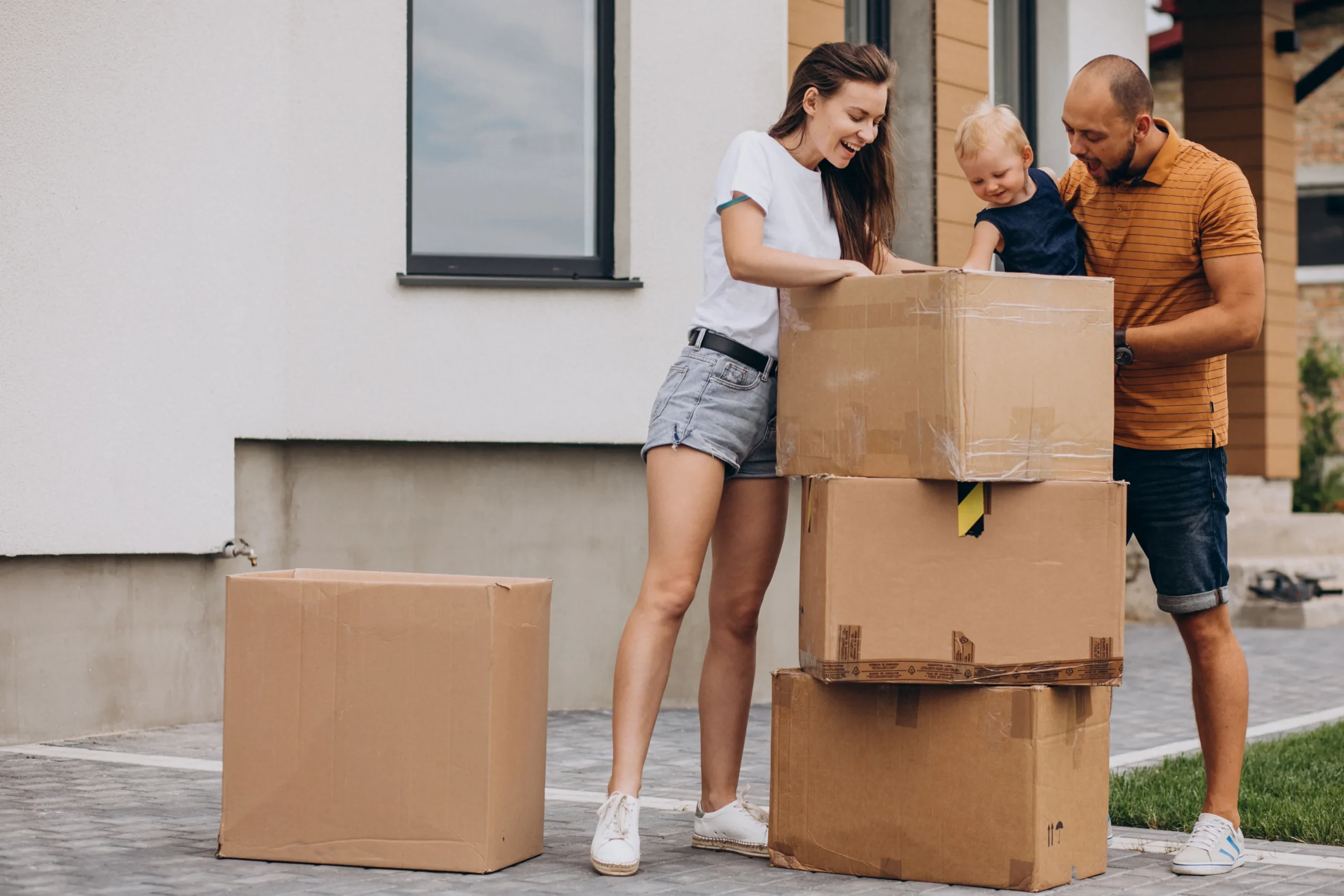 a married couple unpacking boxes